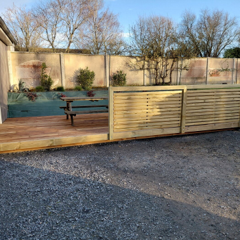 Terrasse bois et palissade à Audrieu